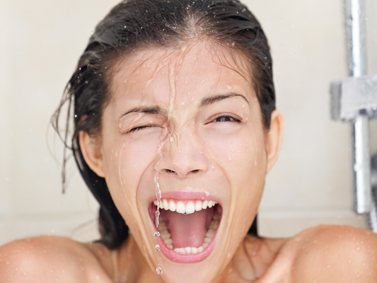 woman in cold shower
