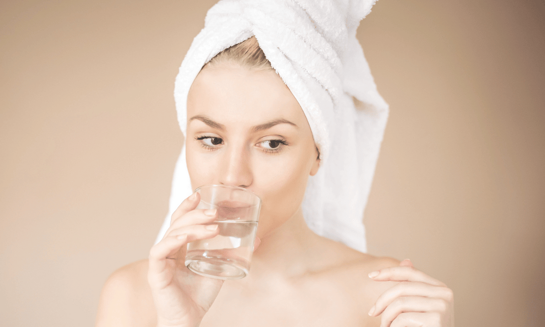 Woman Drinking Glass of Water