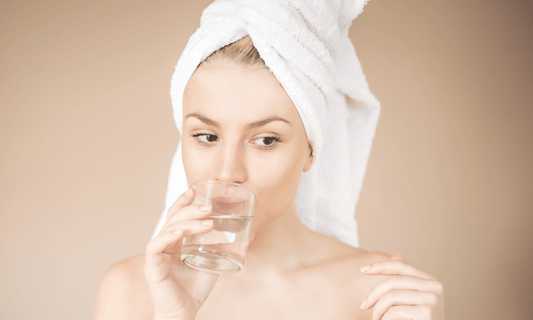 Woman Drinking Glass of Water